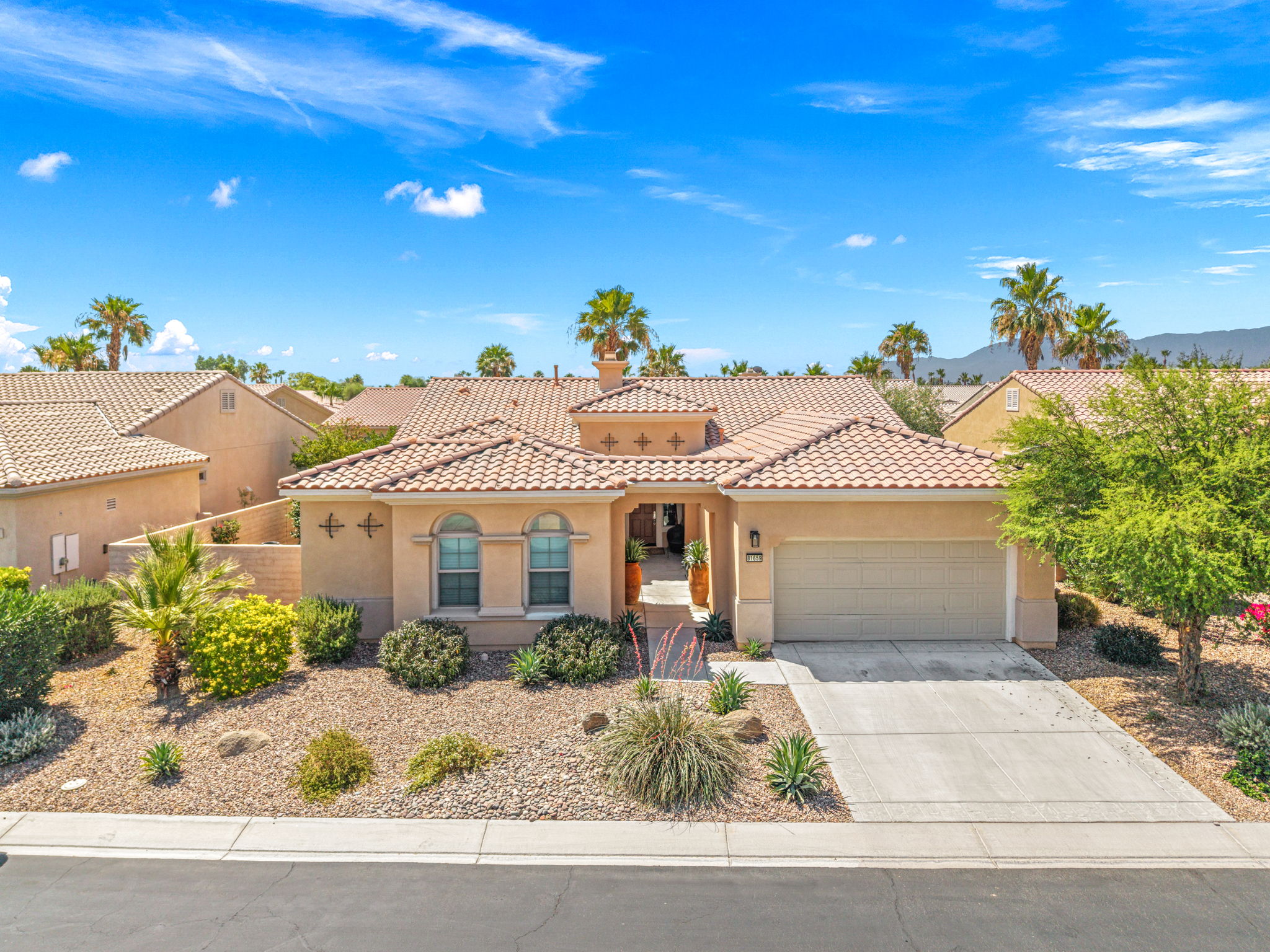 Front exterior of 81659 Camino El Triunfo in Sun City Shadow Hills, Indio, California